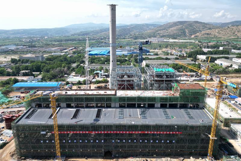 匠心澆筑，榮耀封頂——隴西熱電聯(lián)產(chǎn)項目主廠房結構全面封頂